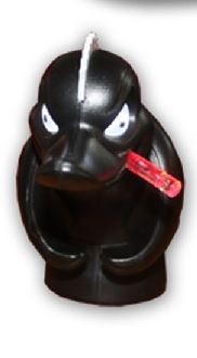 Schwarze LED-Innenleuchte Turbo Duck aus Gummi mit rotem Licht im Mund.