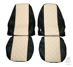 Paar LKW-Sitzbez�ge aus schwarzem und cremefarbenem Kunstleder mit gewaffeltem Mittelteil.