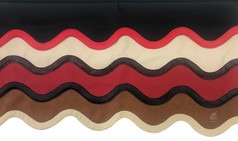 Scheibenbord�re in Lederoptik mit wellenf�rmigen Schichten in Schwarz, Rot, Beige und Braun.