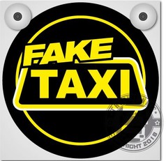 Schwarze runde Platte f�r Leuchtkasten mit gelbem "FAKE TAXI" Schriftzug.
