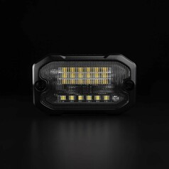 Strands UNITY Szenenlicht mit schwarzem Geh�use und gerippter klarer Linse, zeigt gelbe und wei�e LEDs.