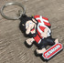Farbiger Schl�sselanh�nger aus Gummi mit einem Troll, der eine d�nische Flagge h�lt und �DENMARK� zeigt.