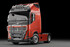 Roter Volvo FH4+5 LKW mit Trux Dachlampenb�gel "Top Boge" aus Aluminium und runden Fernscheinwerfern.